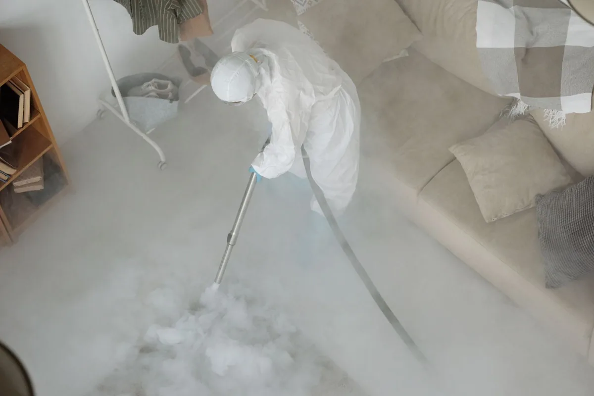 Biohazard cleanup technician in protective equipment, Intercourse, PA